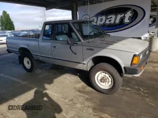 ✅ 1986 Nissan 720 • VIN: JN6ND06Y9GW100514 • Lot: 54895105. Wystawiony na Copart z przebiegiem 159 323 mil. Bezpłatny archiwum sprzedaży aukcyjnych z USA i szczegółowy raport historii pojazdu na DreamBid. Zdjęcie 4.