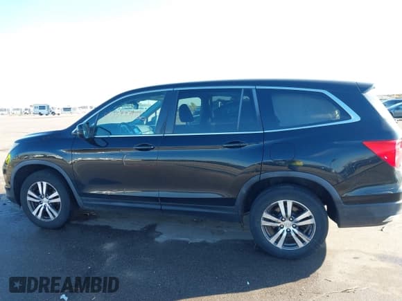 ✅ 2016 Honda Pilot EX-L • VIN: 5FNYF6H67GB032565 • Lot: 43522486. Wystawiony na IAAI z przebiegiem 154 223 mil. Bezpłatny archiwum sprzedaży aukcyjnych z USA i szczegółowy raport historii pojazdu na DreamBid. Zdjęcie 14.