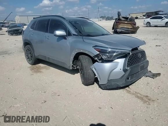 ✅ 2023 Toyota Corolla Cross XLE • VIN: 7MUDAAAG2PV063498 • Лот: 80942835. Опубликован ранее на Copart с пробегом 33 249 миль. Бесплатный доступ к архиву аукционных продаж из США и подробный отчёт об истории автомобиля на DreamBid. Изображение 14.