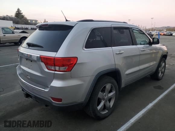 ✅ 2012 Jeep Grand Cherokee Overland • VIN: 1C4RJFCT8CC332736 • Lot: 87726165. Listed on Copart with 151,711 mi. Free auction sales archive from the USA and detailed vehicle history report at DreamBid. Image 3.