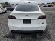 ✅ 2024 Tesla Model Y Long Range • VIN: 7SAYGDEE0RA259547 • Лот: 61723055. Опубликован ранее на Copart с пробегом 23 881 миль. Бесплатный доступ к архиву аукционных продаж из США и подробный отчёт об истории автомобиля на DreamBid. Изображение 6.