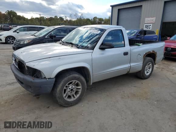 2004 Dodge Dakota z VIN 1D7FL16K24S621269, wystawiony jako Copart lot #75284304 z przebiegiem Nie podano mil oraz Szkoda całkowita • Salvage title. Historia ofert i sprzedaży dostępna na DreamBid. Obrazek 1.