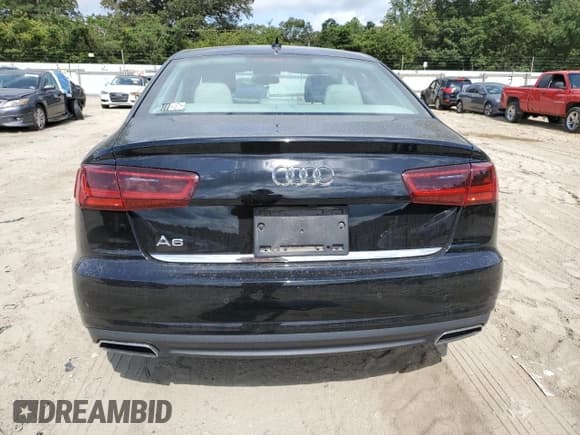✅ 2016 Audi A6 Premium • VIN: WAUCFAFC1GN129958 • Лот: 68568975. Опубликован ранее на Copart с пробегом 99 328 миль. Бесплатный доступ к архиву аукционных продаж из США и подробный отчёт об истории автомобиля на DreamBid. Изображение 6.