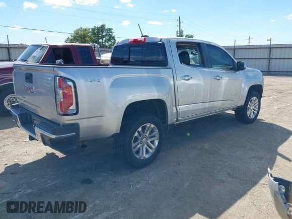 ✅ 2019 GMC Canyon 4WD SLT • VIN: 1GTG6DEN7K1242385 • Лот: 40313042. Опубликован ранее на IAAI с пробегом 53 635 миль. Бесплатный доступ к архиву аукционных продаж из США и подробный отчёт об истории автомобиля на DreamBid. Изображение 4.