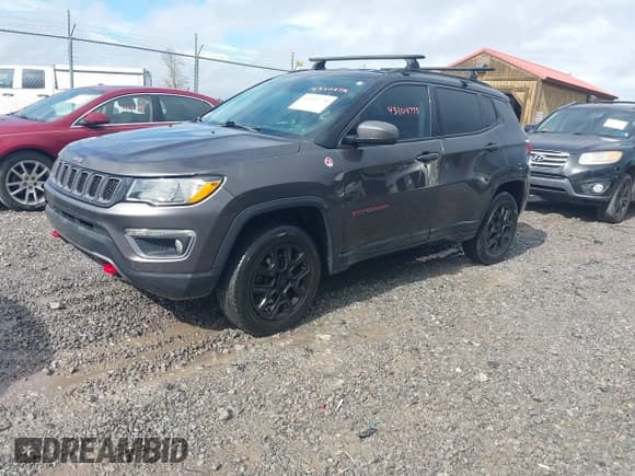 ✅ 2017 Jeep Compass Trailhawk • VIN: 3C4NJDDB3HT675054 • Lot: 43304770. Wystawiony na IAAI z przebiegiem 254 162 mil. Bezpłatny archiwum sprzedaży aukcyjnych z USA i szczegółowy raport historii pojazdu na DreamBid. Zdjęcie 2.