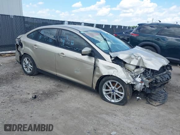 ✅ 2018 Ford Focus SE • VIN: 1FADP3FE2JL311761 • Lot: 42599206. Listed on IAAI with 71,655 mi. Free auction sales archive from the USA and detailed vehicle history report at DreamBid. Image 1.