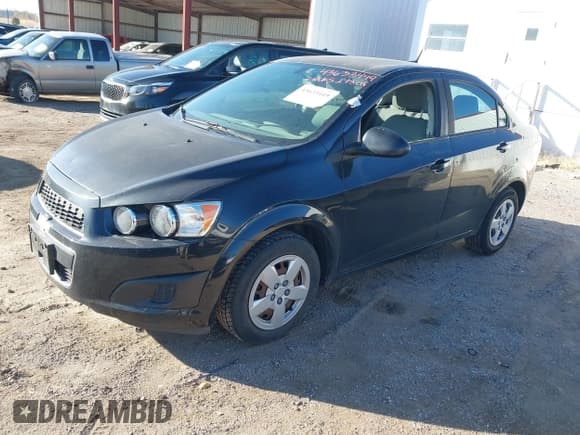 ✅ 2014 Chevrolet Sonic LS • VIN: 1G1JA5SH0E4214903 • Lot: 43633449. Listed on IAAI with 68,732 mi. Free auction sales archive from the USA and detailed vehicle history report at DreamBid. Image 2.