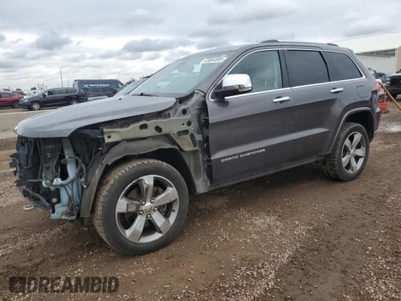 ✅ 2014 Jeep Grand Cherokee Overland • VIN: 1C4RJFCT6EC426312 • Lot: 85564995. Listed on Copart with 131,140 mi. Free auction sales archive from the USA and detailed vehicle history report at DreamBid. Image 1.