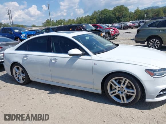 ✅ 2016 Audi A6 Premium Plus • VIN: WAUGFAFC7GN009857 • Lot: 43258709. Wystawiony na IAAI z przebiegiem 143 043 mil. Bezpłatny archiwum sprzedaży aukcyjnych z USA i szczegółowy raport historii pojazdu na DreamBid. Zdjęcie 13.