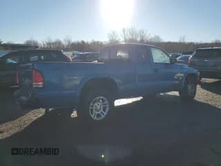 ✅ 2003 Dodge Dakota Sport • VIN: 1D7HL32X63S141658 • Lot: 85207614. Wystawiony na Copart z przebiegiem 147 920 mil. Bezpłatny archiwum sprzedaży aukcyjnych z USA i szczegółowy raport historii pojazdu na DreamBid. Zdjęcie 3.