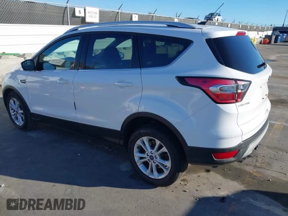 ✅ 2017 Ford Escape SE • VIN: 1FMCU0G94HUC53585 • Лот: 43465934. Опубликован ранее на IAAI с пробегом 144 694 миль. Бесплатный доступ к архиву аукционных продаж из США и подробный отчёт об истории автомобиля на DreamBid. Изображение 3.