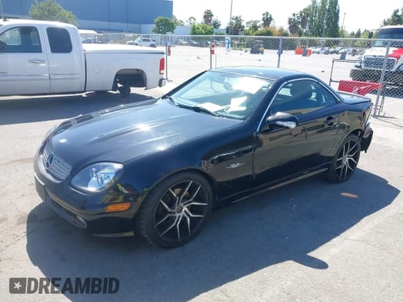 ✅ 2004 Mercedes-Benz SLK 230/320 • VIN: WDBKK65FX4F308099 • Lot: 42320907. Listed on IAAI with 173,122 mi. Free auction sales archive from the USA and detailed vehicle history report at DreamBid. Image 2.