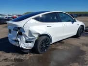 ✅ 2023 Tesla Model Y Long Range • VIN: 7SAYGDEE0PF945202 • Lot: 41611762. Listed on IAAI with 7,316 mi. Free auction sales archive from the USA and detailed vehicle history report at DreamBid. Image 4.