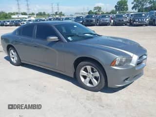 2012 Dodge Charger SXT Plus z VIN 2C3CDXHG4CH164593, wystawiony jako IAAI lot #42580974 z przebiegiem 130 175 mil mil oraz . Historia ofert i sprzedaży dostępna na DreamBid. Obrazek 1.