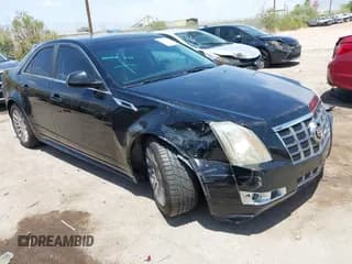 ✅ 2012 Cadillac CTS Premium • VIN: 1G6DP5E35C0129064 • Lot: 42666308. Listed on IAAI with 151,694 mi. Free auction sales archive from the USA and detailed vehicle history report at DreamBid. Image 1.