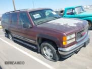 ✅ 1997 GMC Suburban • VIN: 3GKFK16R6VG513437 • Лот: 41919529. Опубликован ранее на IAAI с пробегом 357 887 миль. Бесплатный доступ к архиву аукционных продаж из США и подробный отчёт об истории автомобиля на DreamBid. Изображение 1.