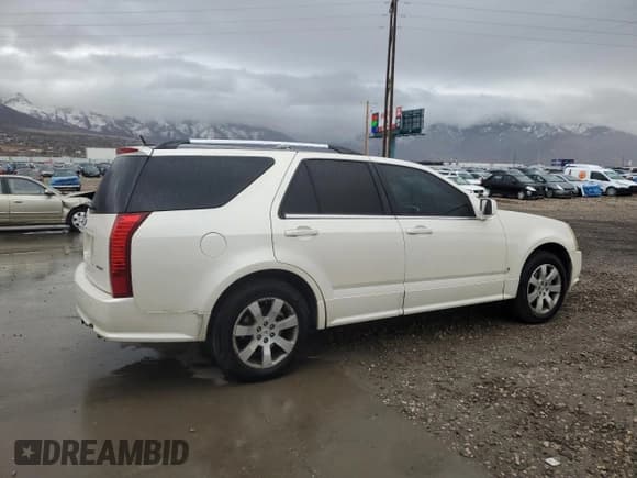 ✅ 2008 Cadillac SRX • VIN: 1GYEE63A280100878 • Lot: 43991375. Listed on Copart with 157,092 mi. Free auction sales archive from the USA and detailed vehicle history report at DreamBid. Image 3.