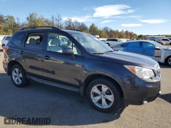 ✅ 2015 Subaru Forester Premium • VIN: JF2SJADCXFH475585 • Lot: 86812015. Listed on Copart with 141,916 mi. Free auction sales archive from the USA and detailed vehicle history report at DreamBid. Image 4.