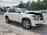 2019 Chevrolet Tahoe LS with VIN 1GNSCAKC9KR151048, listed as a Copart auction lot 69196595 with 100,702 mi miles and Salvage title. Bid and sale history available at DreamBid. Image 4.