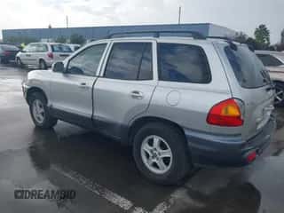 2003 Hyundai Santa Fe z VIN KM8SB12B73U504531, wystawiony jako IAAI lot #41506719 z przebiegiem 164 566 mil mil oraz . Historia ofert i sprzedaży dostępna na DreamBid. Obrazek 3.