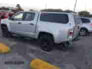 2018 Chevrolet Colorado 2WD LT z VIN 1GCGSCEN2J1229807, wystawiony jako IAAI lot #43391851 z przebiegiem 88 766 mil mil oraz . Historia ofert i sprzedaży dostępna na DreamBid. Obrazek 3.