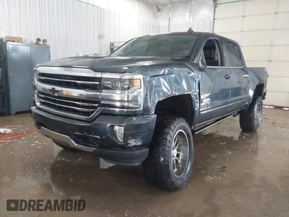 ✅ 2017 Chevrolet Silverado 1500 High Country • VIN: 3GCUKTEJ3HG296721 • Lot: 41609238. Listed on IAAI with 129,811 mi. Free auction sales archive from the USA and detailed vehicle history report at DreamBid. Image 17.
