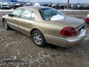 ✅ 1999 Lincoln Continental • VIN: 1LNHM97V2XY644250 • Lot: 82440454. Wystawiony na Copart z przebiegiem 196 568 mil. Bezpłatny archiwum sprzedaży aukcyjnych z USA i szczegółowy raport historii pojazdu na DreamBid. Zdjęcie 2.