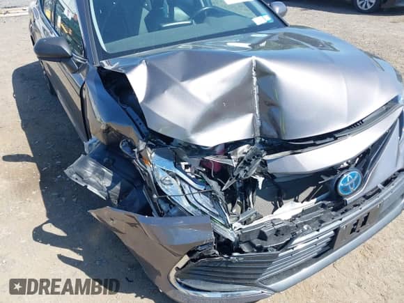 2022 Toyota Camry Hybrid XLE with VIN 4T1F31AK2NU597994, listed as a IAAI auction lot 42550485 with 71,900 mi miles and . Bid and sale history available at DreamBid. Image 6.