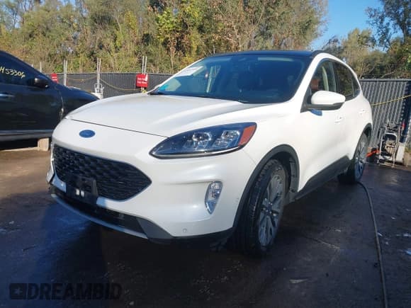 ✅ 2020 Ford Escape Titanium Hybrid • VIN: 1FMCU9DZ5LUC34870 • Lot: 43452554. Wystawiony na IAAI z przebiegiem 62 457 mil. Bezpłatny archiwum sprzedaży aukcyjnych z USA i szczegółowy raport historii pojazdu na DreamBid. Zdjęcie 2.