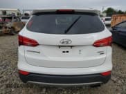✅ 2015 Hyundai Santa Fe • VIN: 5XYZTDLB6FG296051 • Lot: 50414204. Wystawiony na Copart z przebiegiem 136 750 mil. Bezpłatny archiwum sprzedaży aukcyjnych z USA i szczegółowy raport historii pojazdu na DreamBid. Zdjęcie 6.