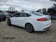 ✅ 2017 Ford Fusion Hybrid Titanium • VIN: 3FA6P0RU7HR187914 • Lot: 82234005. Listed on Copart with 290,959 mi. Free auction sales archive from the USA and detailed vehicle history report at DreamBid. Image 2.
