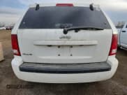 ✅ 2010 Jeep Grand Cherokee Laredo • VIN: 1J4PR4GK0AC124959 • Lot: 93464675. Wystawiony na Copart z przebiegiem 211 365 mil. Bezpłatny archiwum sprzedaży aukcyjnych z USA i szczegółowy raport historii pojazdu na DreamBid. Zdjęcie 6.