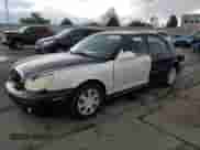 2004 Hyundai Sonata with VIN KMHWF25S54A937355, listed as a Copart auction lot 55038445 with 216,282 mi miles and Salvage title. Bid and sale history available at DreamBid. Image 1.