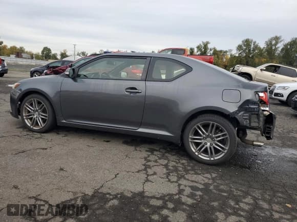 ✅ 2012 Scion tC • VIN: JTKJF5C70C3044875 • Lot: 85420385. Listed on Copart with 86,956 mi. Free auction sales archive from the USA and detailed vehicle history report at DreamBid. Image 2.