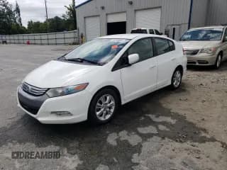 ✅ 2011 Honda Insight EX • VIN: JHMZE2H72BS004899 • Лот: 69949094. Опубликован ранее на Copart с пробегом 214 349 миль. Бесплатный доступ к архиву аукционных продаж из США и подробный отчёт об истории автомобиля на DreamBid. Изображение 1.