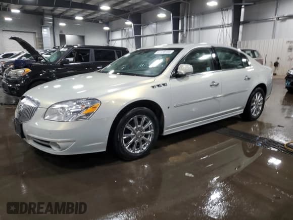 ✅ 2010 Buick Lucerne CXL-3 • VIN: 1G4HE5EMXAU109214 • Лот: 81588164. Опубликован ранее на Copart с пробегом 82 359 миль. Бесплатный доступ к архиву аукционных продаж из США и подробный отчёт об истории автомобиля на DreamBid. Изображение 1.
