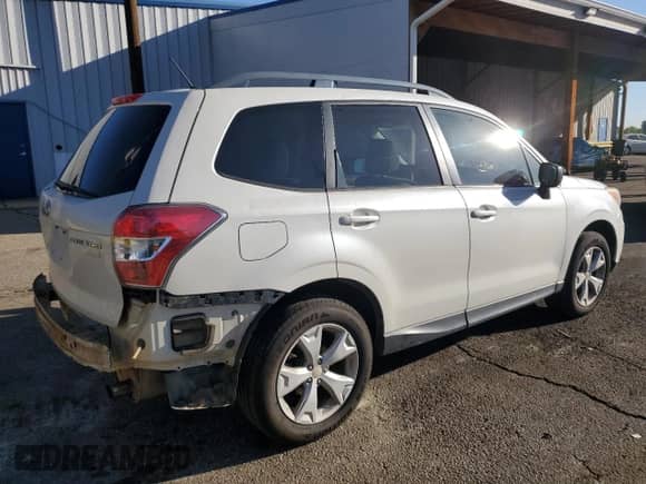 2015 Subaru Forester Premium with VIN JF2SJADC4FH464470, listed as a Copart auction lot 84954675 with 148,219 mi miles and Salvage title. Bid and sale history available at DreamBid. Image 3.