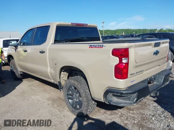 2022 Chevrolet Silverado 1500 Custom Trail Boss with VIN 3GCPDCED7NG682474, listed as a IAAI auction lot 42160845 with 19,528 mi miles and . Bid and sale history available at DreamBid. Image 3.