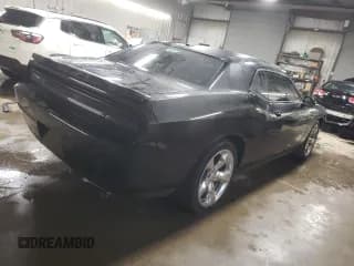 ✅ 2013 Dodge Challenger SXT • VIN: 2C3CDYAG9DH520005 • Lot: 77024504. Wystawiony na Copart z przebiegiem 48 802 mil. Bezpłatny archiwum sprzedaży aukcyjnych z USA i szczegółowy raport historii pojazdu na DreamBid. Zdjęcie 3.