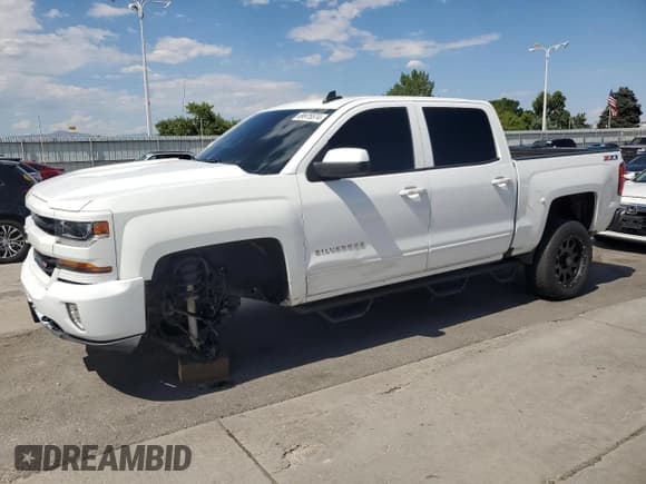 ✅ 2017 Chevrolet Silverado 1500 LT • VIN: 3GCUKREC7HG317266 • Лот: 69975574. Опубликован ранее на Copart с пробегом 80 099 миль. Бесплатный доступ к архиву аукционных продаж из США и подробный отчёт об истории автомобиля на DreamBid. Изображение 1.