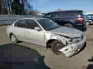 2001 Hyundai Elantra GLS z VIN KMHDN45D71U057338, wystawiony jako Copart lot #79084024 z przebiegiem 137 887 mil mil oraz Szkoda całkowita • Salvage title. Historia ofert i sprzedaży dostępna na DreamBid. Obrazek 4.