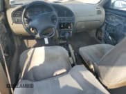 ✅ 2001 Kia Sephia • VIN: KNAFB121315012631 • Лот: 62910125. Опубликован ранее на Copart с пробегом 132 002 миль. Бесплатный доступ к архиву аукционных продаж из США и подробный отчёт об истории автомобиля на DreamBid. Изображение 8.