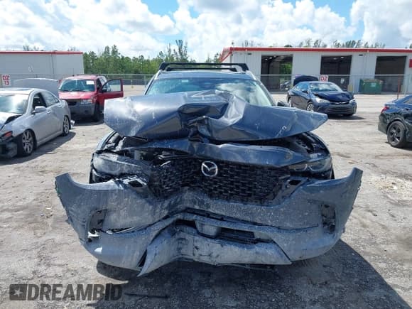✅ 2025 Mazda CX-50 Hybrid Premium Plus Package • VIN: 7MMVAAEW9SN127423 • Lot: 43322908. Wystawiony na IAAI z przebiegiem 2 928 mil. Bezpłatny archiwum sprzedaży aukcyjnych z USA i szczegółowy raport historii pojazdu na DreamBid. Zdjęcie 12.