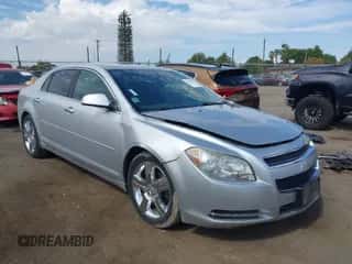 2012 Chevrolet Malibu 1LT z VIN 1G1ZC5E09CF301185, wystawiony jako IAAI lot #43294515 z przebiegiem 136 962 mil mil oraz . Historia ofert i sprzedaży dostępna na DreamBid. Obrazek 1.