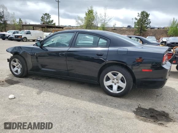 ✅ 2013 Dodge Charger Police • VIN: 2C3CDXAG7DH679826 • Lot: 51085425. Listed on Copart with 143,481 mi. Free auction sales archive from the USA and detailed vehicle history report at DreamBid. Image 2.