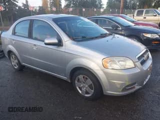 ✅ 2011 Chevrolet Aveo 1LT • VIN: KL1TD5DEXBB122710 • Лот: 43642149. Опубликован ранее на IAAI с пробегом 130 431 миль. Бесплатный доступ к архиву аукционных продаж из США и подробный отчёт об истории автомобиля на DreamBid. Изображение 1.