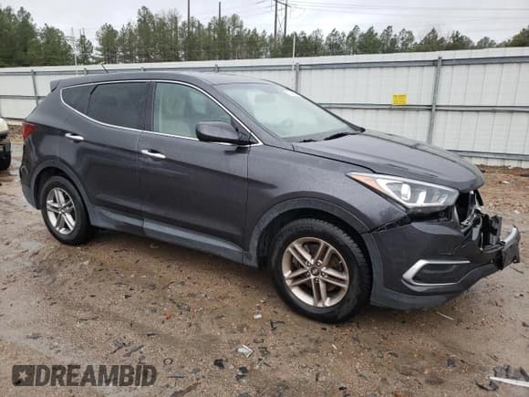 ✅ 2018 Hyundai Santa Fe 2.4L • VIN: 5XYZTDLBXJG562048 • Лот: 37648374. Опубликован ранее на Copart с пробегом 55 653 миль. Бесплатный доступ к архиву аукционных продаж из США и подробный отчёт об истории автомобиля на DreamBid. Изображение 4.