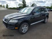 ✅ 2004 Volkswagen Touareg • VIN: WVGBC67L44D010303 • Lot: 70526825. Listed on Copart with 265,608 mi. Free auction sales archive from the USA and detailed vehicle history report at DreamBid. Image 1.