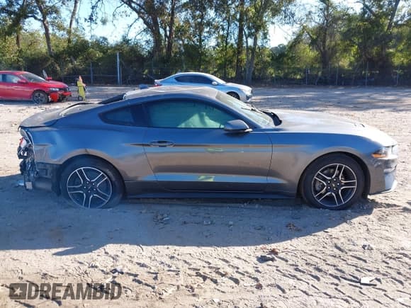 ✅ 2021 Ford Mustang EcoBoost • VIN: 1FA6P8TH8M5134940 • Lot: 43373024. Listed on IAAI with 55,343 mi. Free auction sales archive from the USA and detailed vehicle history report at DreamBid. Image 13.