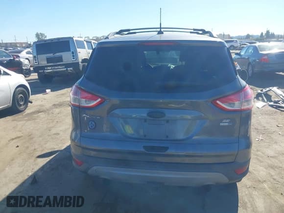 ✅ 2013 Ford Escape SE • VIN: 1FMCU9G97DUD10571 • Lot: 43798281. Listed on IAAI with 156,022 mi. Free auction sales archive from the USA and detailed vehicle history report at DreamBid. Image 16.